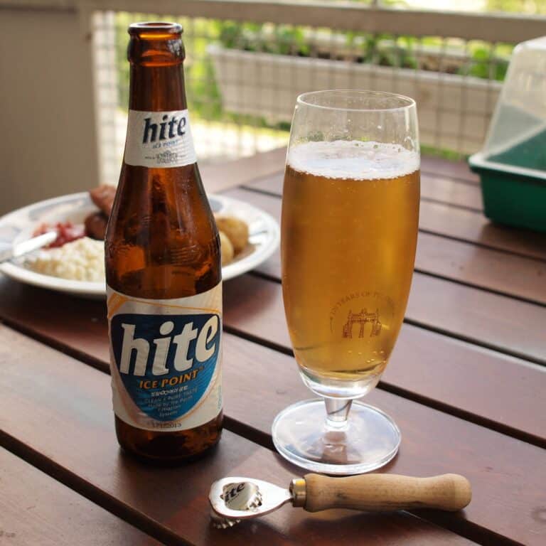 Bottle of Hite poured into a glass 768x768
